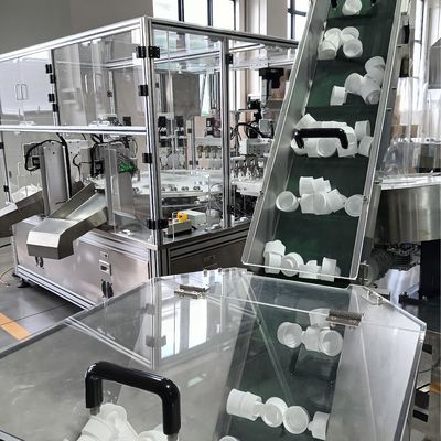 Automated assembly machine for laundry lids, PLC control, display operation, faults will be displayed